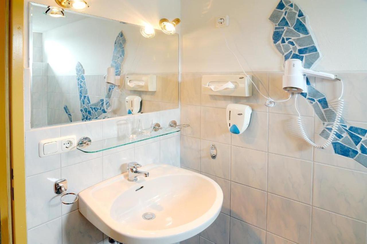 Bruderhofer Hotel อัลท์มุนสเตอร์ ภายนอก รูปภาพ